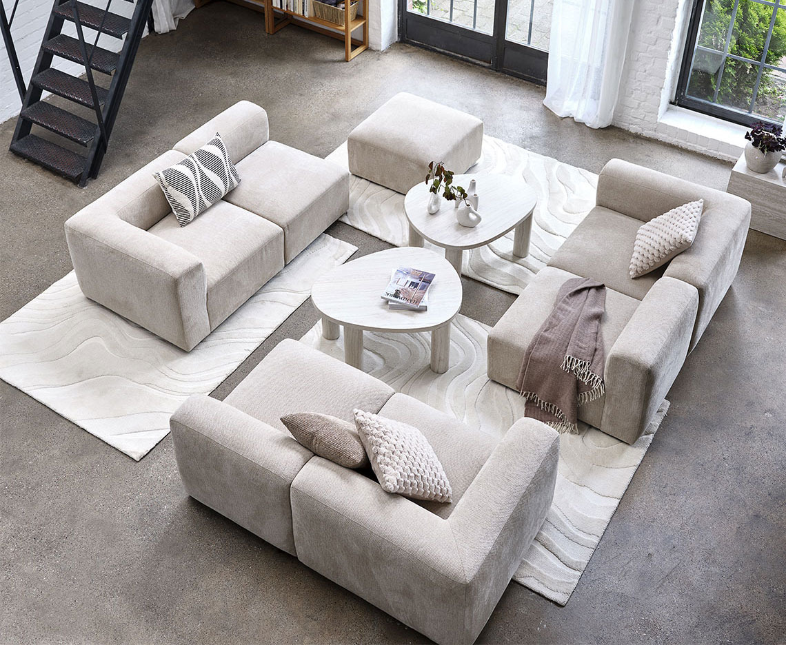 SKEJBY module sofa enters JYSK assortment no later than January 2025 Beige modular sofa centralised in a large living area