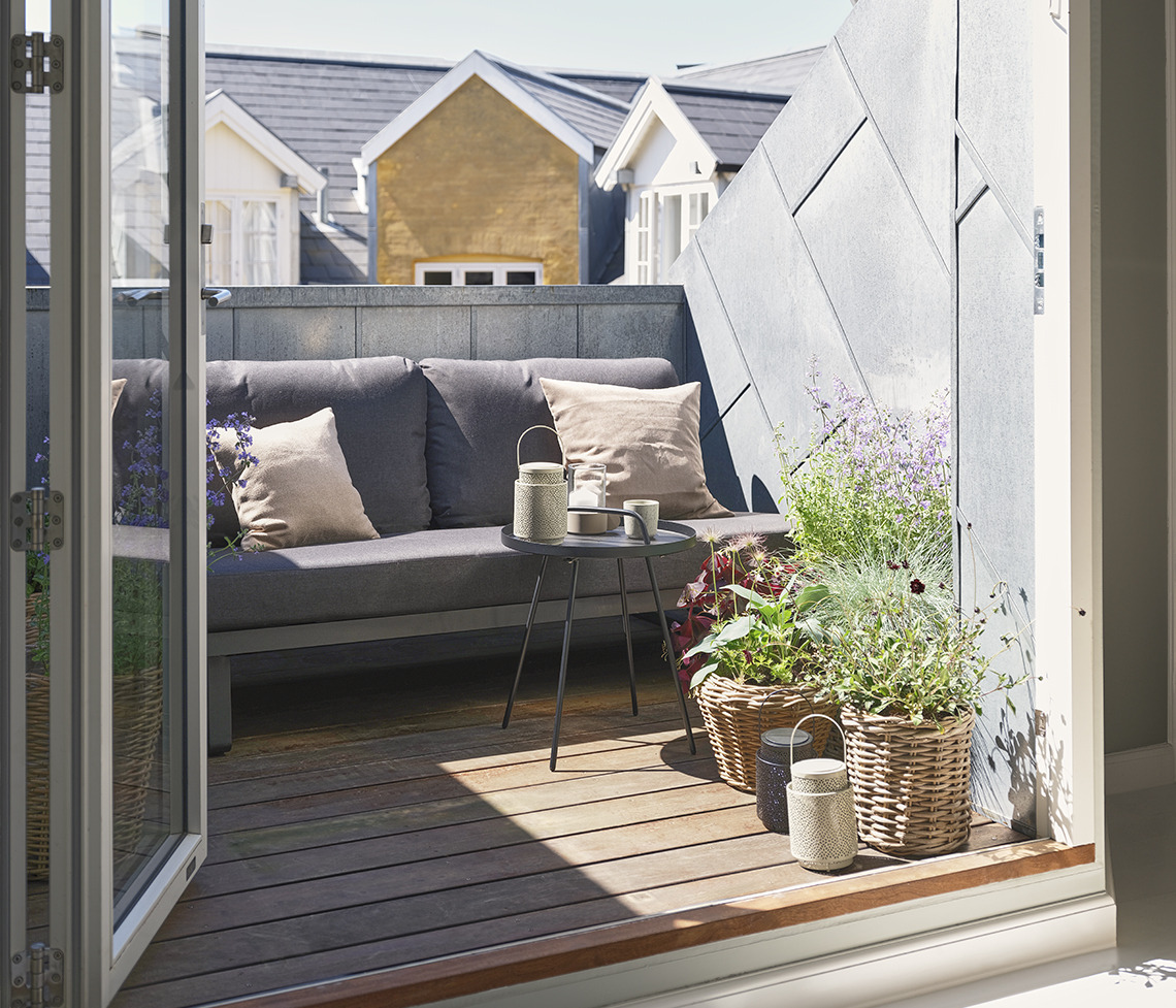 Canapé lounge gris foncé et toutes saisons